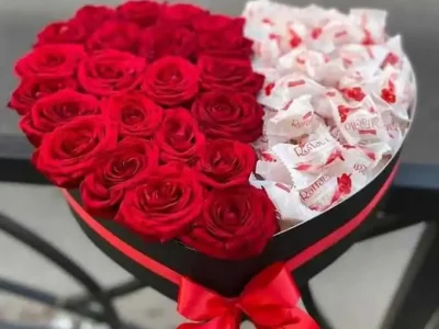 Raffelo truffles and locally grown roses in heartshape box - Theflowers Pakistan