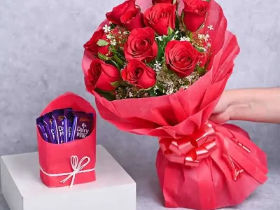 Combination of red roses and dairy milk