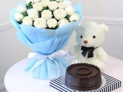 10 White roses Half Kg Blackforest cake with a heart 6 inch teddy - Best Florist in Pakistan